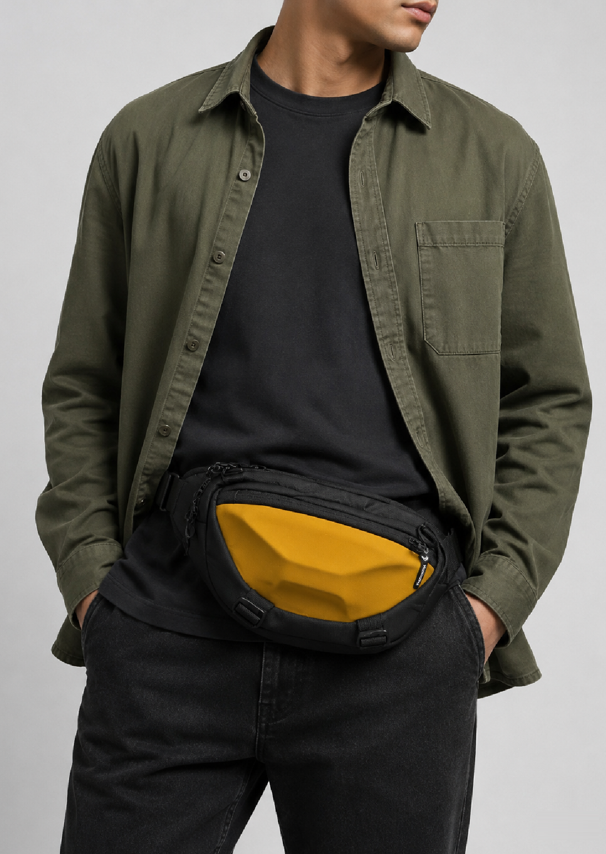 AER Waistbag in Black and Yellow, 2L waist bag worn at the hip