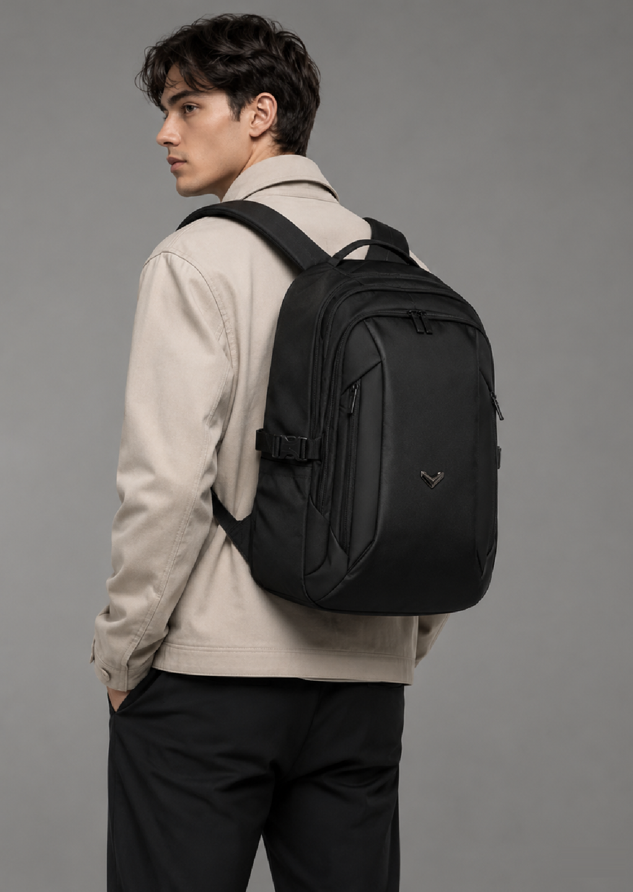 CRISIS Backpack in Black, 25L premium polyester work and commute backpack, worn on the back