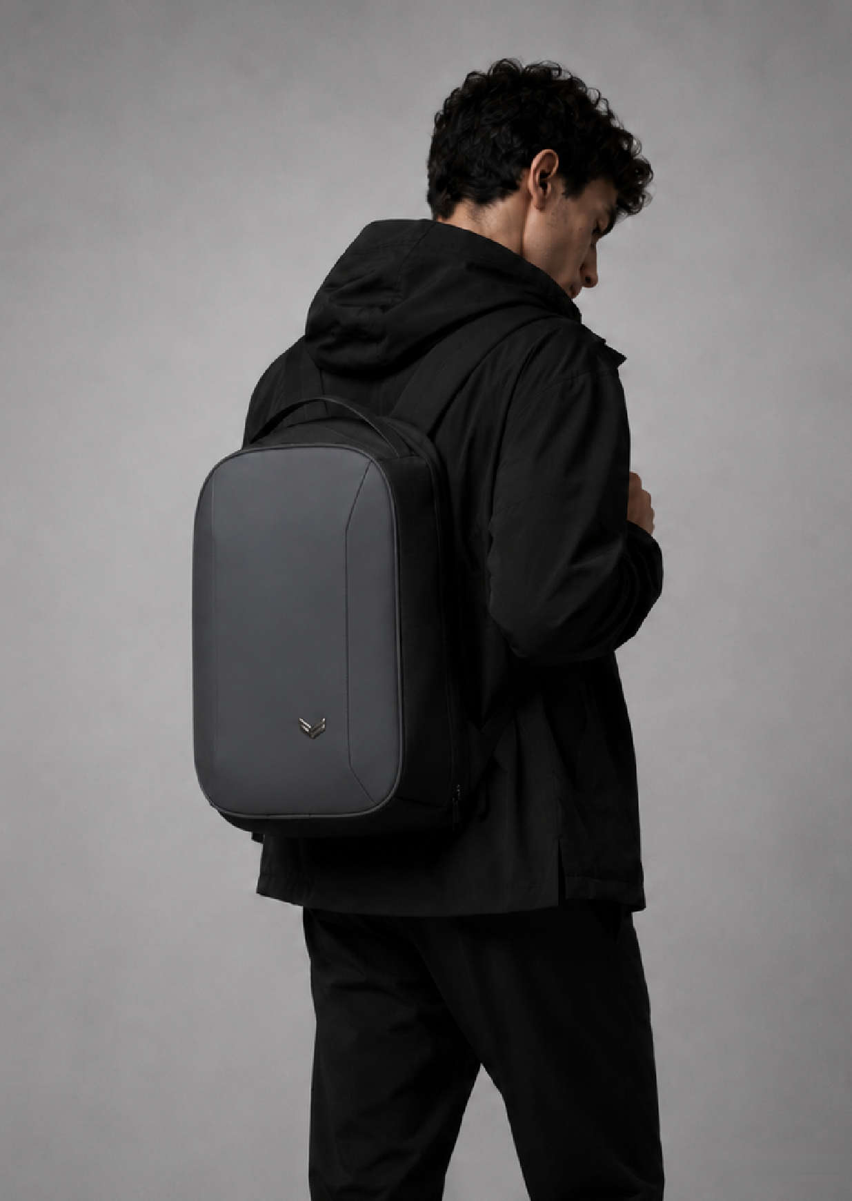 NEXUS Backpack in Black, 26L premium polyester work and travel backpack, worn on the back