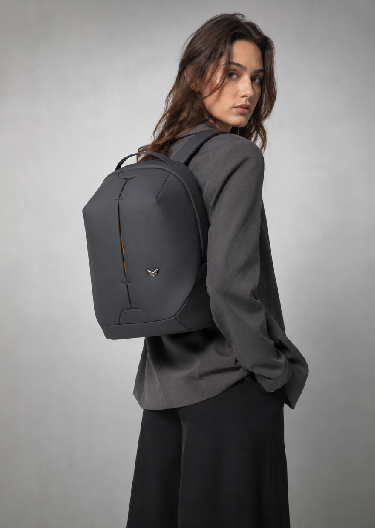 SINGULARITY Backpack in Charcoal Grey, 22L premium polyester daily backpack, worn over the shoulder