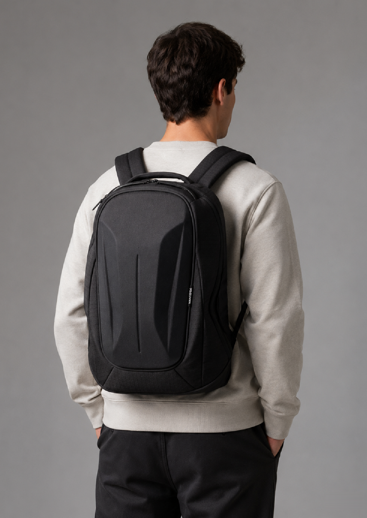 SWITCH Backpack in Black, 24L premium polyester everyday backpack with moulded back panel, worn on the back