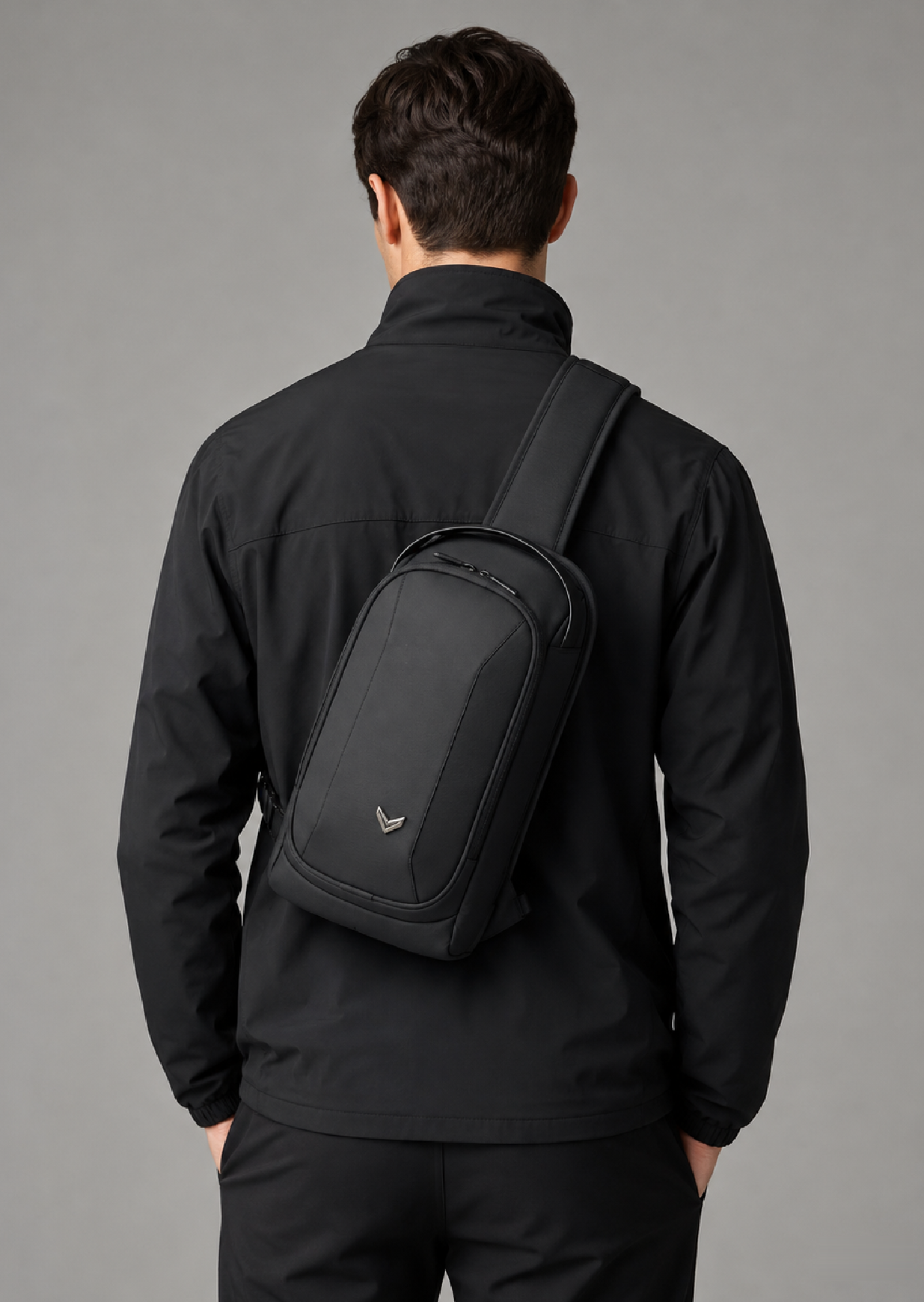 NEXUS Quickpack in Black, 4L crossbody sling bag worn across the back