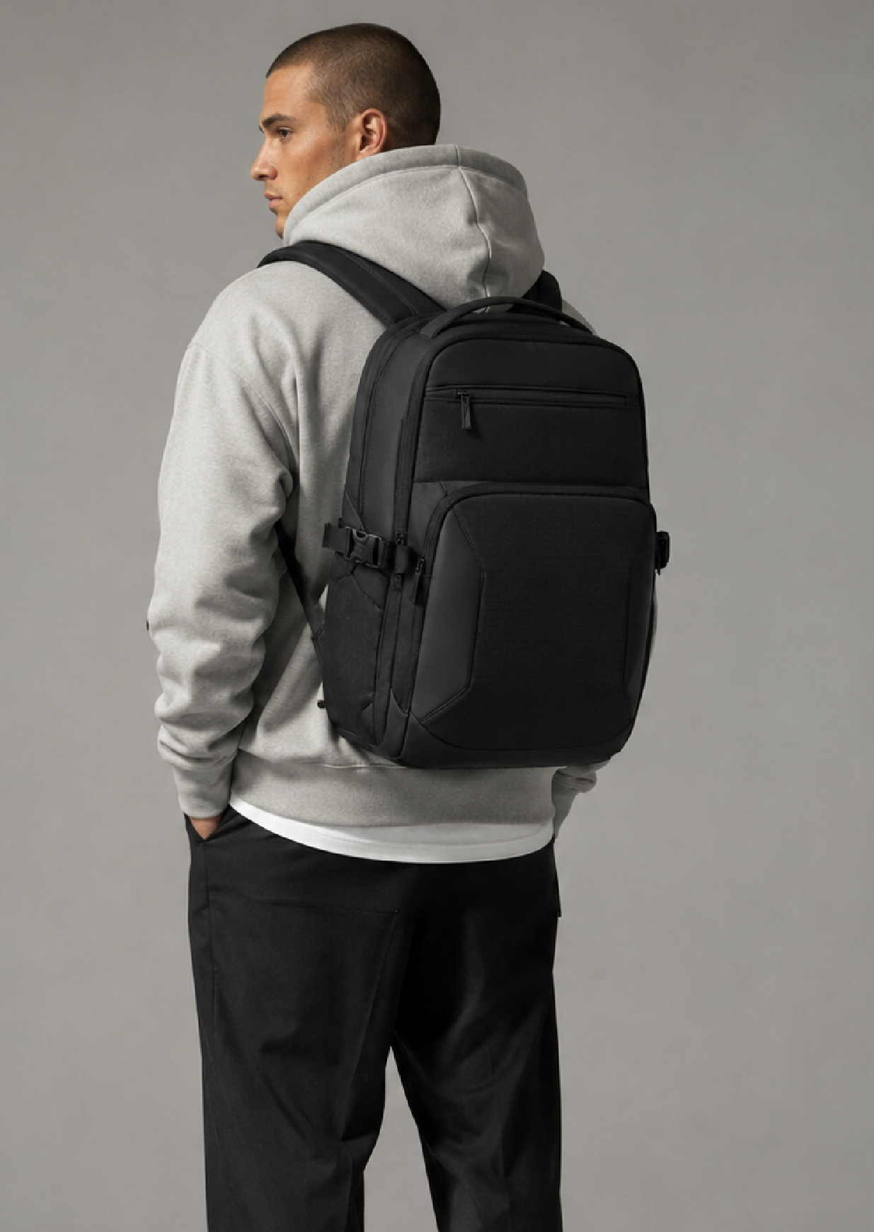 PRELUDE Backpack in Black, 28L premium polyester travel and work backpack with side compression straps, worn on the back